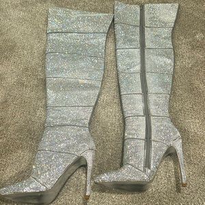 Thigh high, silver sequin Steve Madden boots, honey!!!!